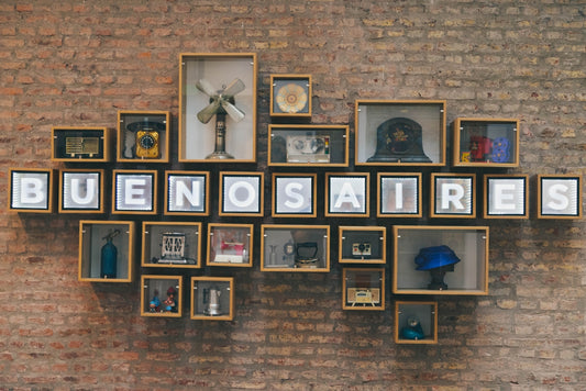 a brick wall with a bunch of different items on it